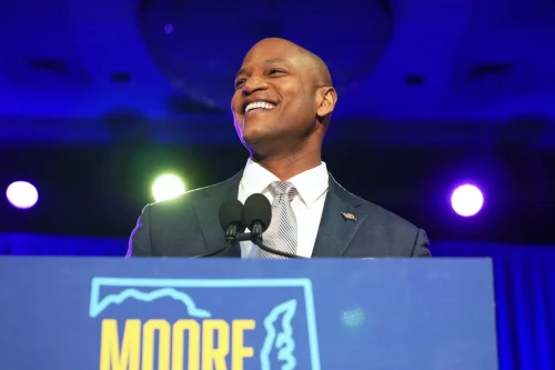 Maryland Gov.-elect Wes Moore celebrates his win at an election night event in Baltimore on Tuesday. (Bryan Woolston / AP)