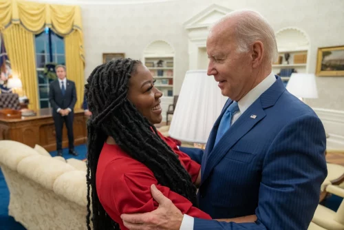 Joe Biden meets Cherelle Griner about the release of Brittney Griner in the Oval Office of the White House on Dec. 8, 2022 in Washington. 9ADAM SCHULTZ/ THE WHITE HOUSE VIA GETTY IMAGES)