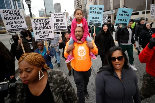 Demonstrators march during a protest on Jan. 28, 2023, in Atlanta, over the death of Tyre Nichols, who died after being beaten by Memphis police. (Alex Slitz/AP)