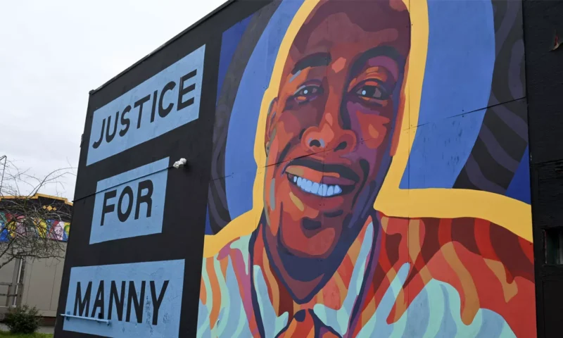 A local mural honors Manuel Ellis, who was killed by Tacoma Police in 2020.