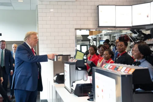 Former U.S. President Donald Trump meets employees during a visit to a Chick-fil-A restaurant on April 10, 2024 in Atlanta, Georgia. Trump is visiting Atlanta for a campaign fundraising event he is hosting. (Photo by Megan Varner/Getty Images)