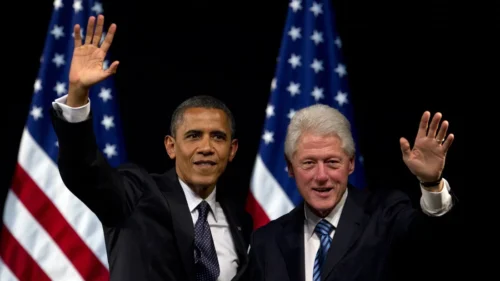 President Obama and former President Bill Clinton appear at a campaign event in New York in June.

Carolyn Kaster/AP