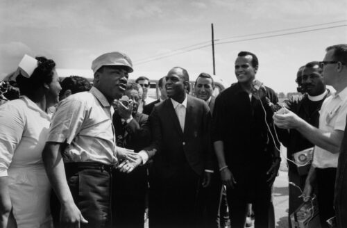 Dr. Martin Luther King, Jr., Nipsy Russell, Tony Bennett, and Harry Belafonte Speaking with the Press, Selma to Montgomery March.  Collection of the Smithsonian National Museum of African American History and Culture, Gift of Monica Karales and the Estate of James Karales, (Estate of James Karales.)