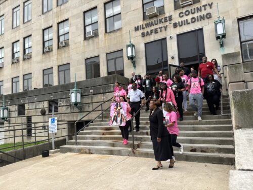A group of supporters and family of Sade Robinson, who was murdered, gathered of the Milwaukee County Courthouse on June 6, 2025. (Evan Casey/WPR)
