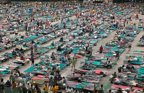 Houston,TX.,9/1/2005--Thousands of hurricane Katrina survivors from New Orleans are bussed to refuge at a Red Cross shelter in the Houston Astrodome.
(FEMA /Andrea Booher)