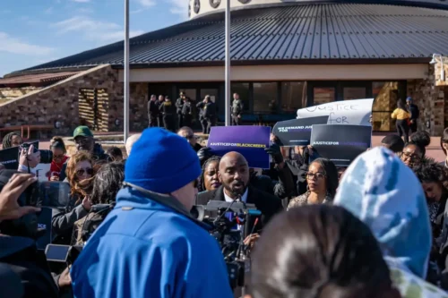 Attorney Damario Solomon-Simmons speaks to reporters outside the Muscogee Creek Nation court building after a judge delayed ruling on a lawsuit that demands Black Creek descendants be reinstated into the tribe of their ancestors on December 1, 2022. (Mike Creef / The Black Wall Street Times)