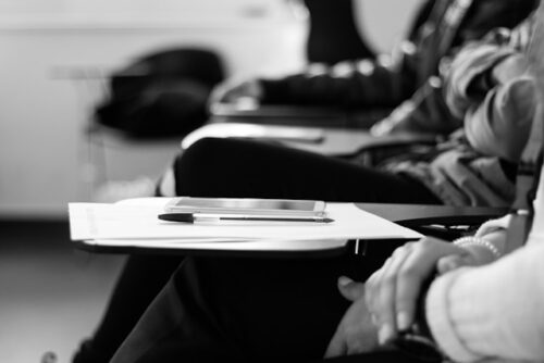 Students sitting at classroom desks