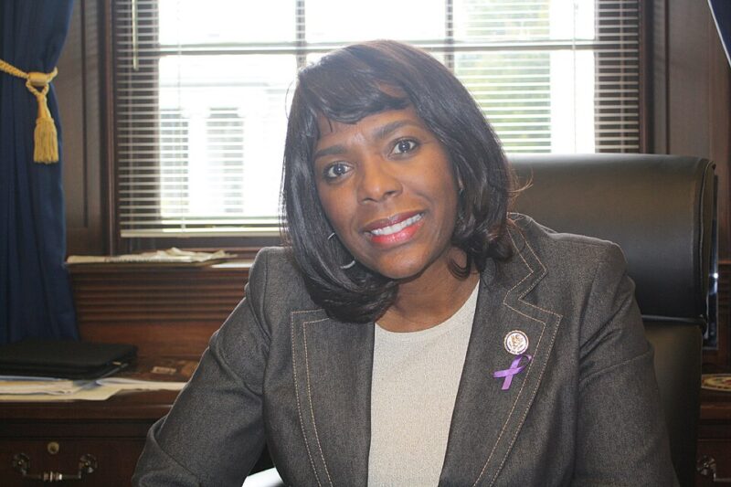 Congresswoman Terri Sewell sitting and smiling at the camera