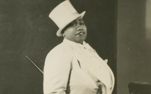 Gladys Bentley in light-colored suit with cane