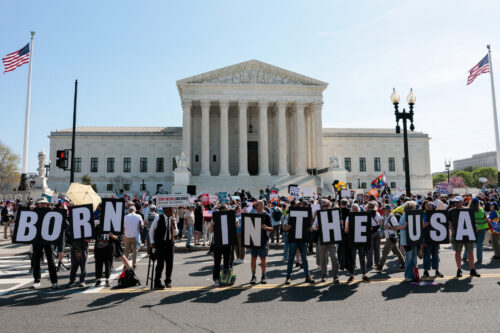 Demonstrators rally in support of birthright citizenship outside the US Supreme Court as President Donald Trump attends oral arguments in Washington, DC on April 1, 2026. President Donald Trump is watching in person as the US Supreme Court hears a landmark case weighing the constitutionality of his contentious bid to end birthright citizenship, an extraordinary and possibly unprecedented move for the nation's highest office. (Photo by Kent Nishimura / AFP via Getty Images)