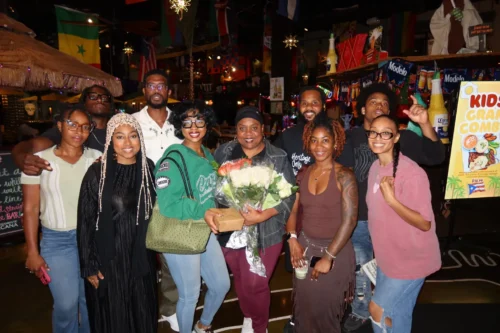 Jennine Labuzan (center) is continuing to pursue legal action in Mississippi to acquire land purchased by her ancestor in the mid-1800s. Labuzan is shown after her release from federal custody. (Courtesy of Fajr DeLane)