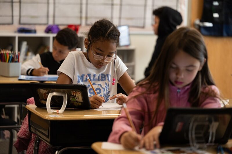 Third grade students at the Northwest Elementary school works on a math exercise. (USDA, Wikimedia Public Domain)